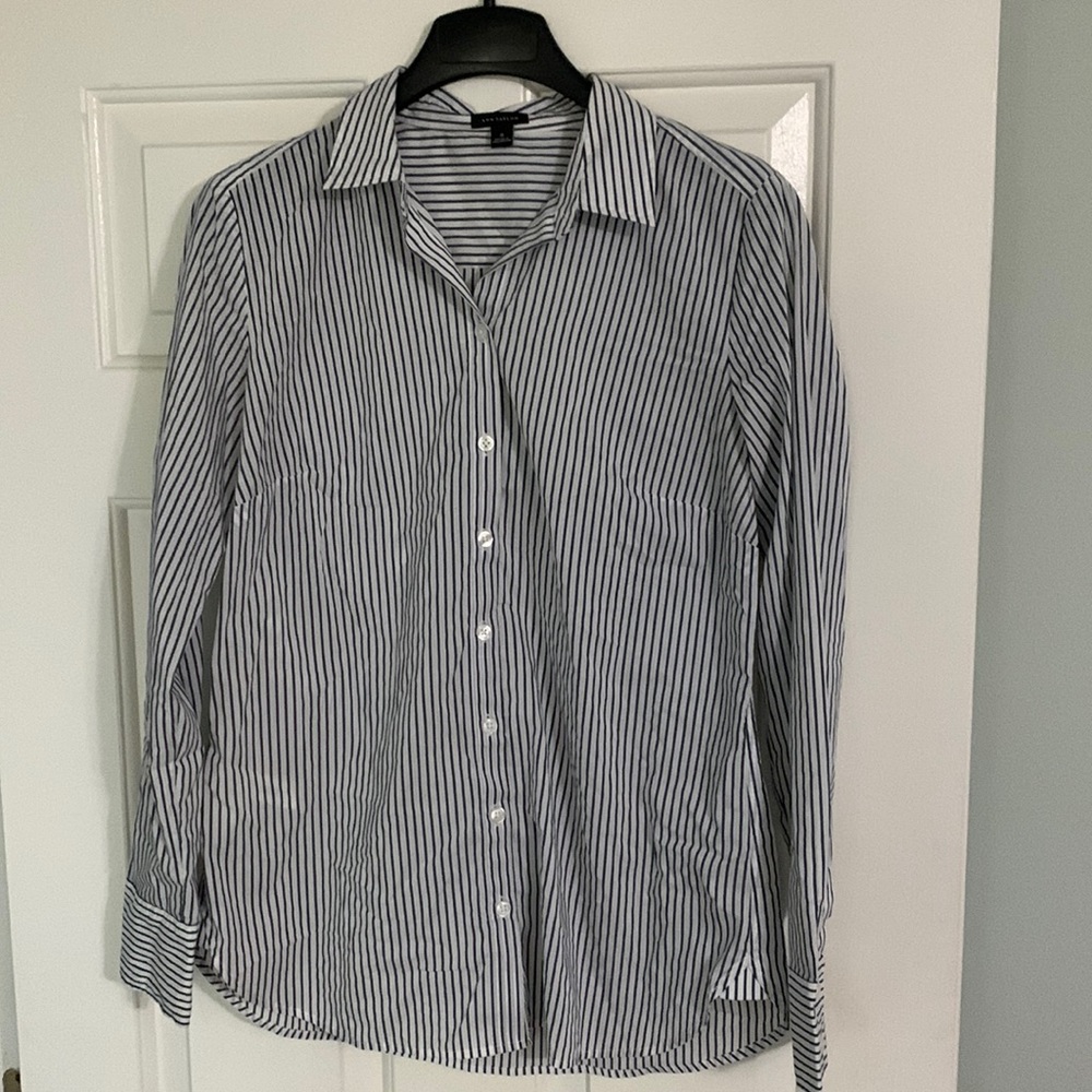 Nice cotton/polyester shirt size 8. Long sleeved with cuffs